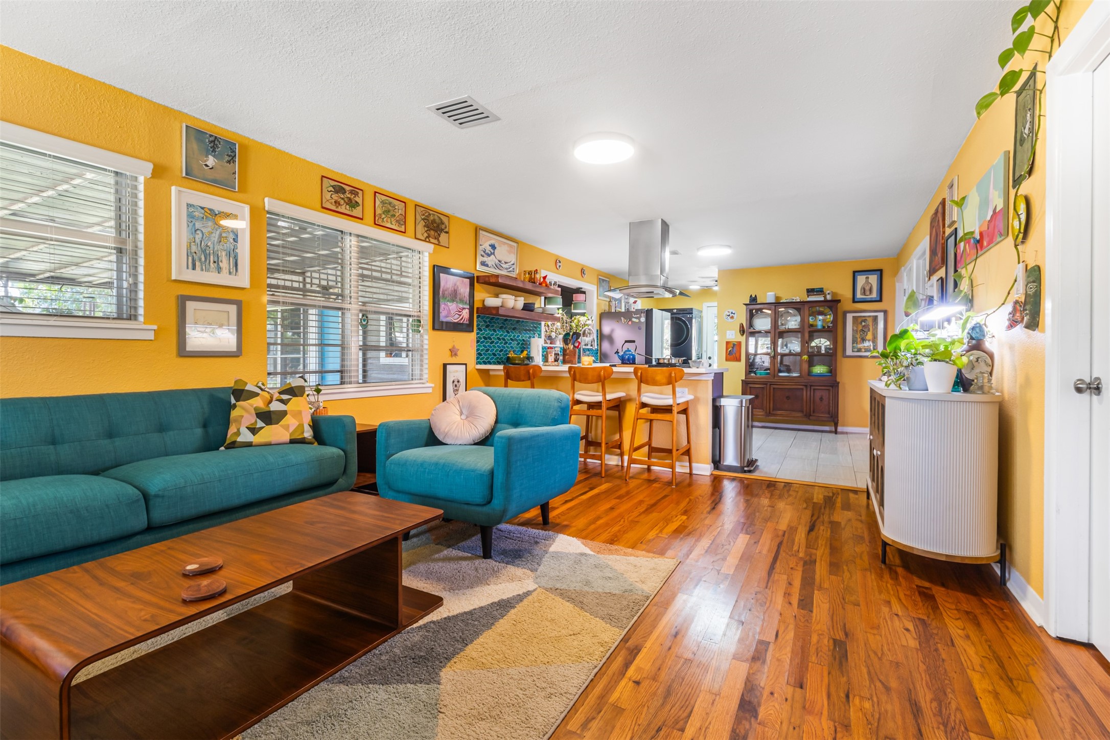 405 West 17th Street Georgetown, TX 78626 - Photo 2 of 21 a living room with furniture a rug and a table