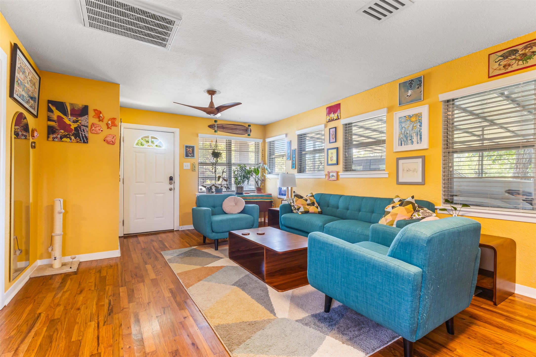 405 West 17th Street Georgetown, TX 78626 - Photo 3 of 21 a living room with furniture and a large window