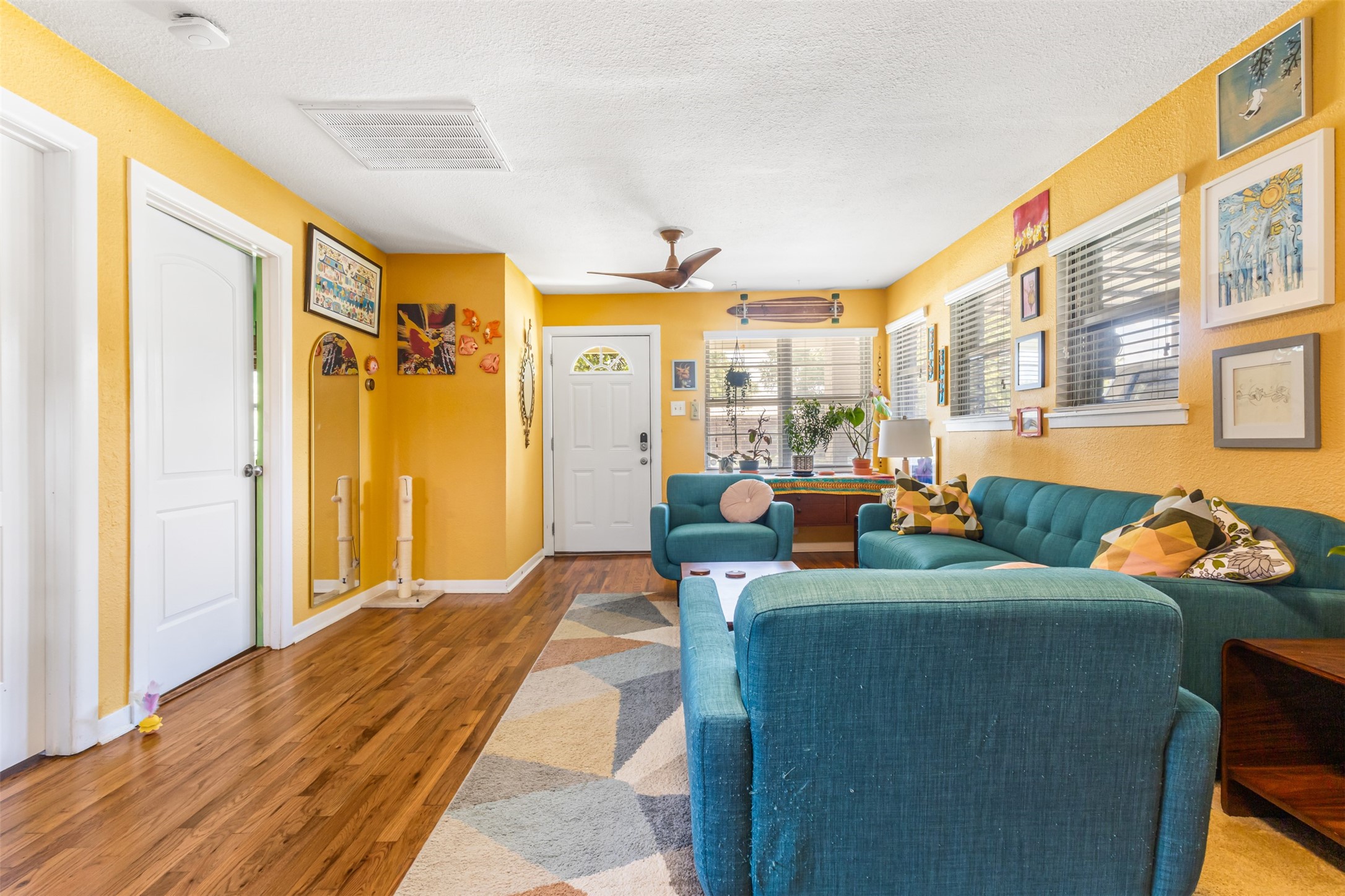405 West 17th Street Georgetown, TX 78626 - Photo 4 of 21 a living room filled with furniture and a window