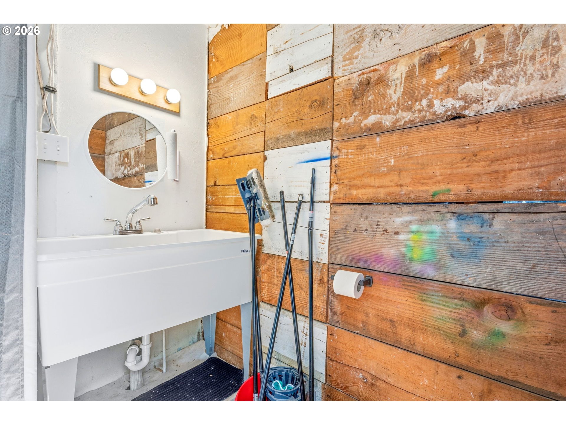 38775 Golden Valley Drive Lebanon, OR 97355 - Photo 13 of 36 a bathroom with a sink and a mirror