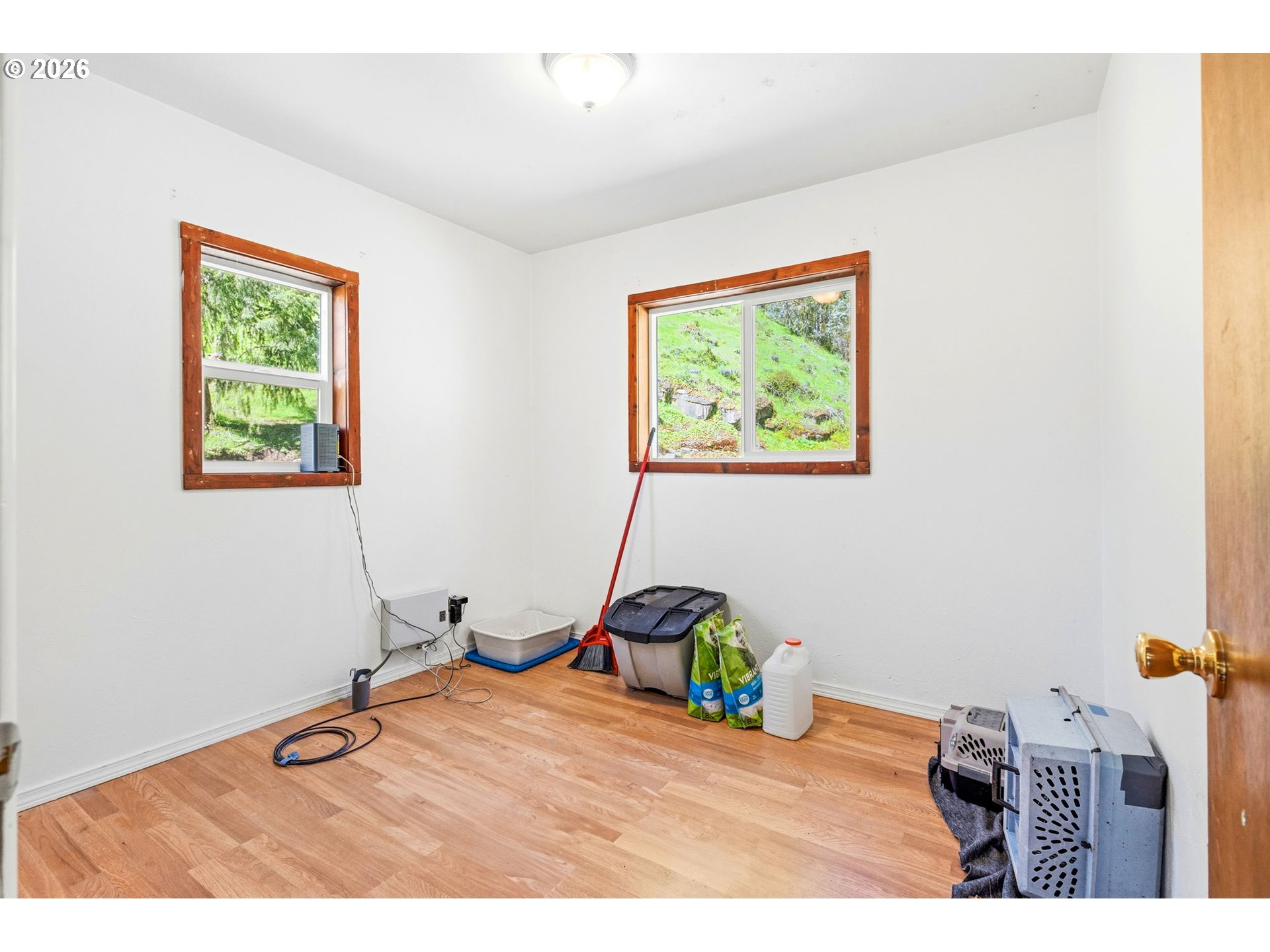 38775 Golden Valley Drive Lebanon, OR 97355 - Photo 8 of 36 a room with gym equipment and a window