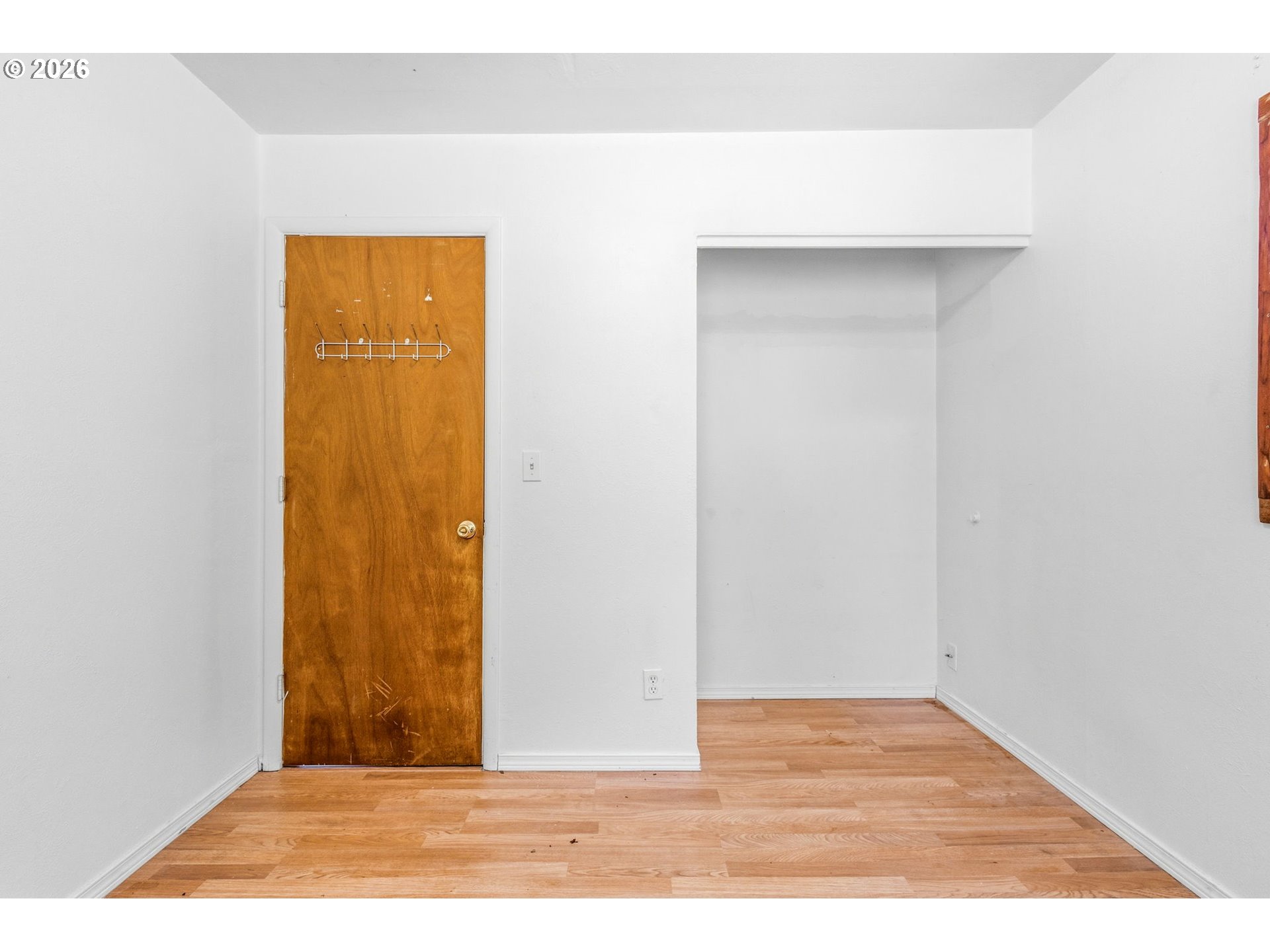 38775 Golden Valley Drive Lebanon, OR 97355 - Photo 9 of 36 a view of an empty room with wooden floor