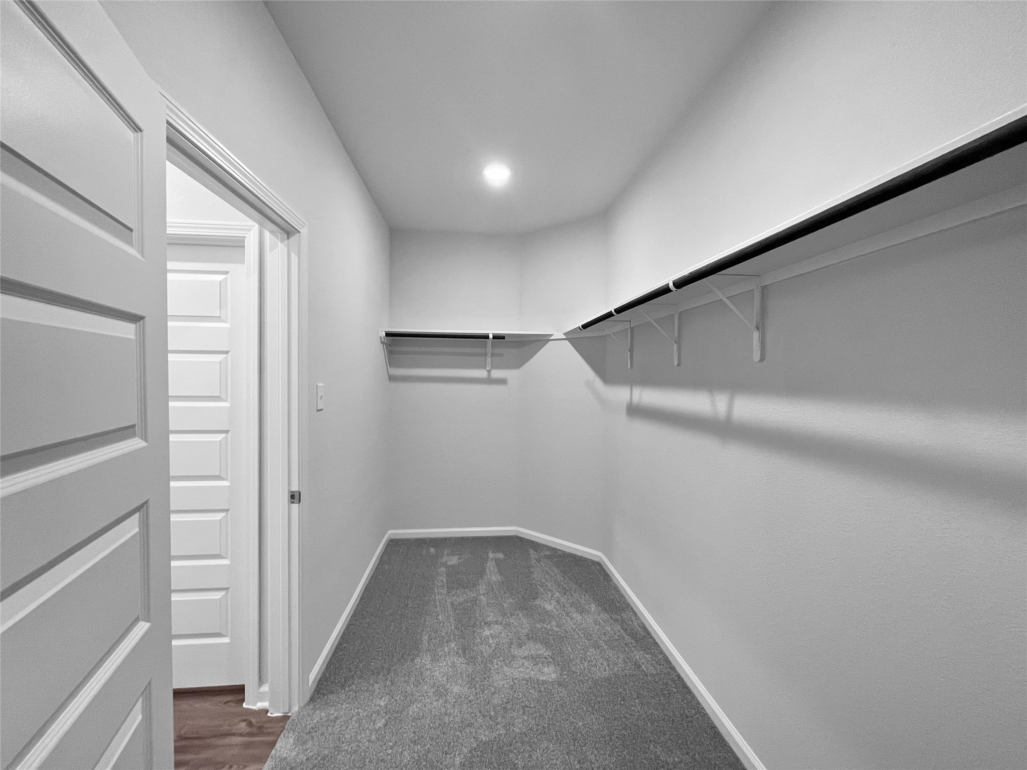 8523 Fly Line Lane Fulshear, TX 77441 - Photo 15 of 23 The Sparrow II- Primary Walk-in Closet. Sample image for illustration; upgrades, options, and colors may vary.