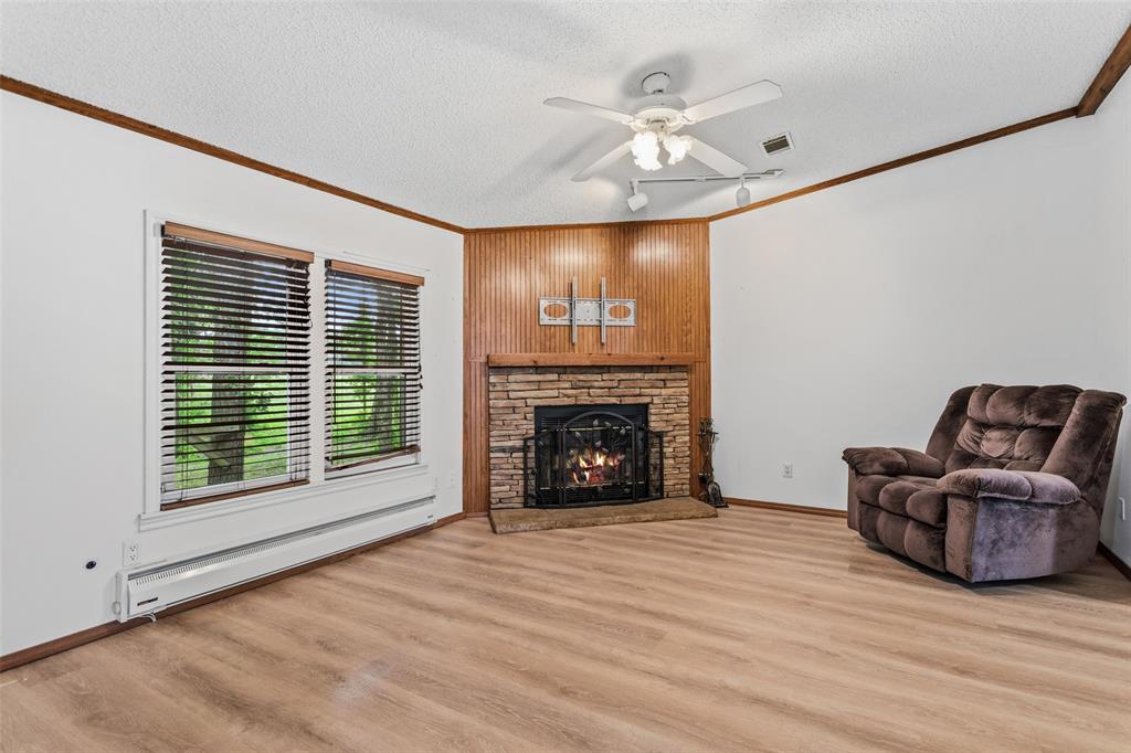 7398 County Road 334 Tyler, TX 75708 - Photo 15 of 39 Private Den with beautiful backyard views and fireplace