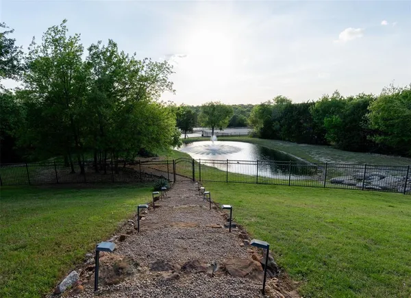 a view of a golf course with a garden