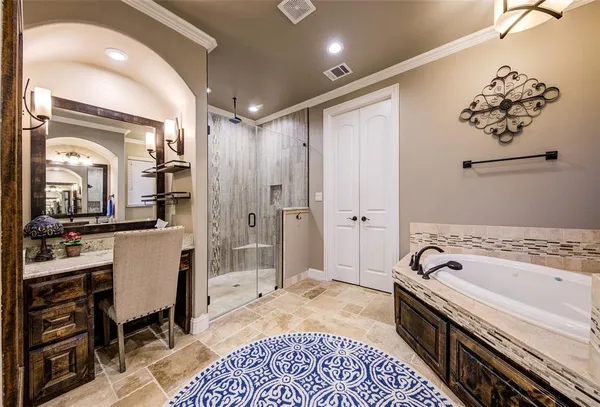 a bathroom with a bathtub and a sink