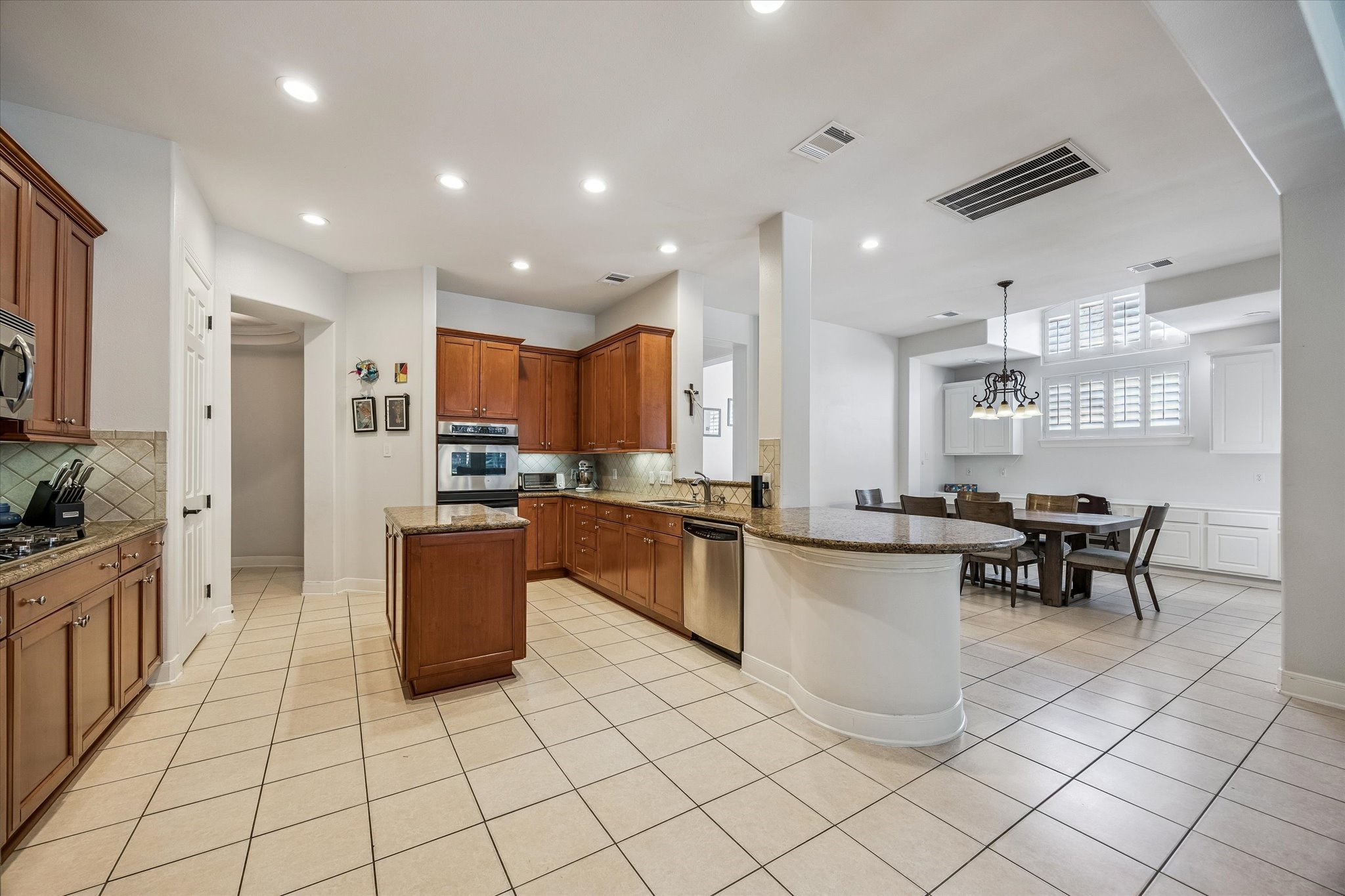 3047 Bonnebridge Way Boulevard Houston, TX 77082 - Photo 50 of 50 This wonderful open floor plan is perfectly suited for today’s lifestyle. The gourmet kitchen offers seamless access to a spacious breakfast area and great family room.