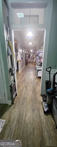 a gym room with lots of gym equipment