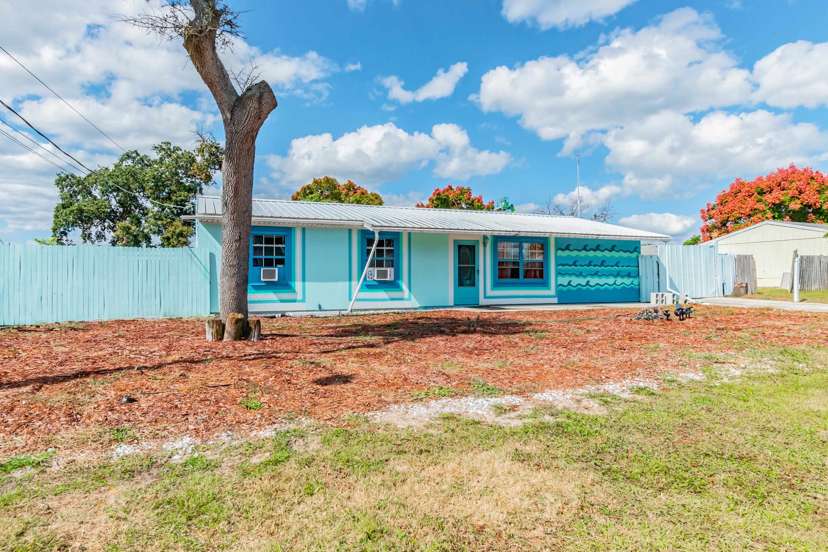 238 Cornell Road St. Augustine, FL 32086 - Photo 1 of 33 a house view with a garden space