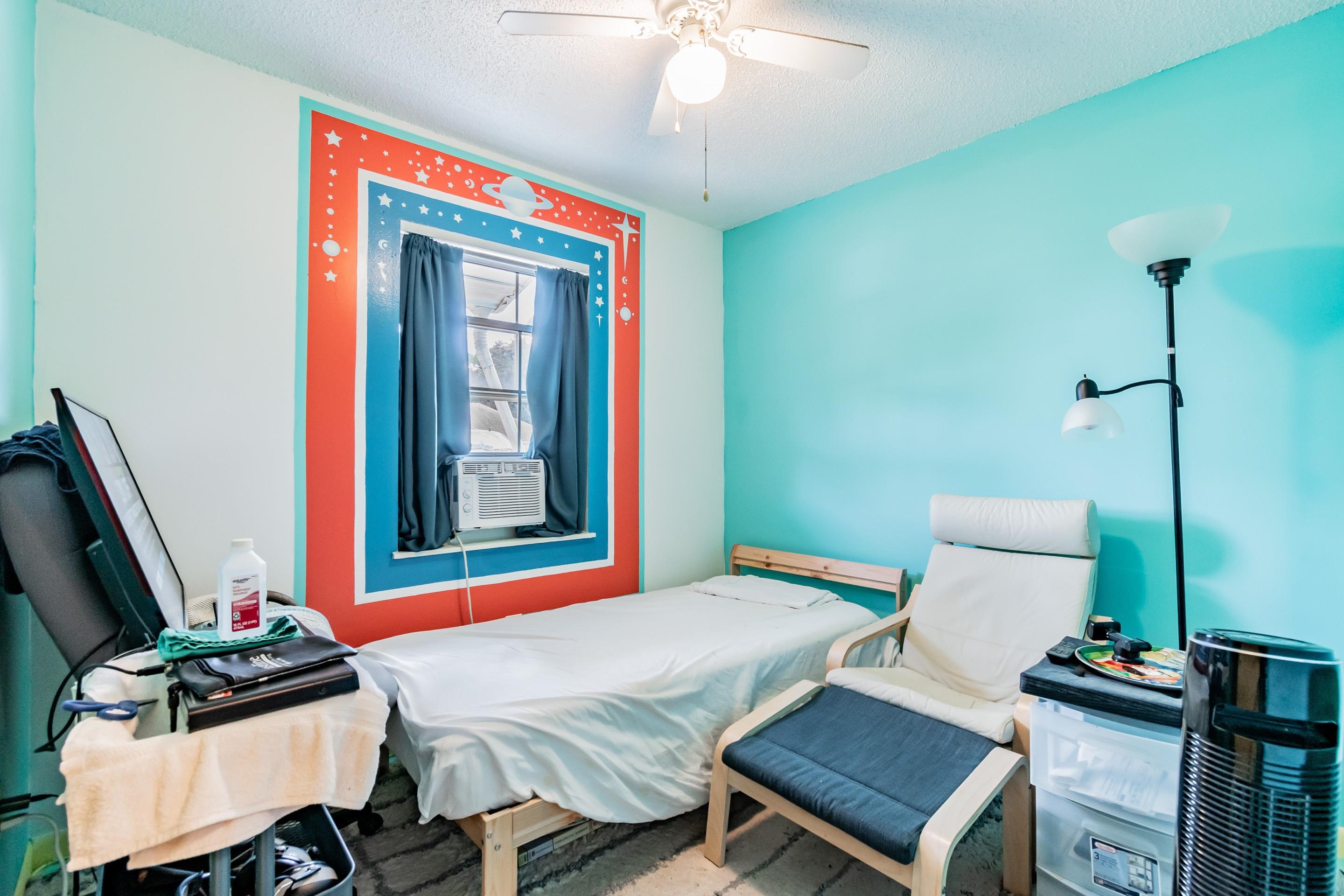 238 Cornell Road St. Augustine, FL 32086 - Photo 17 of 33 a bedroom with a bed and a flat screen tv