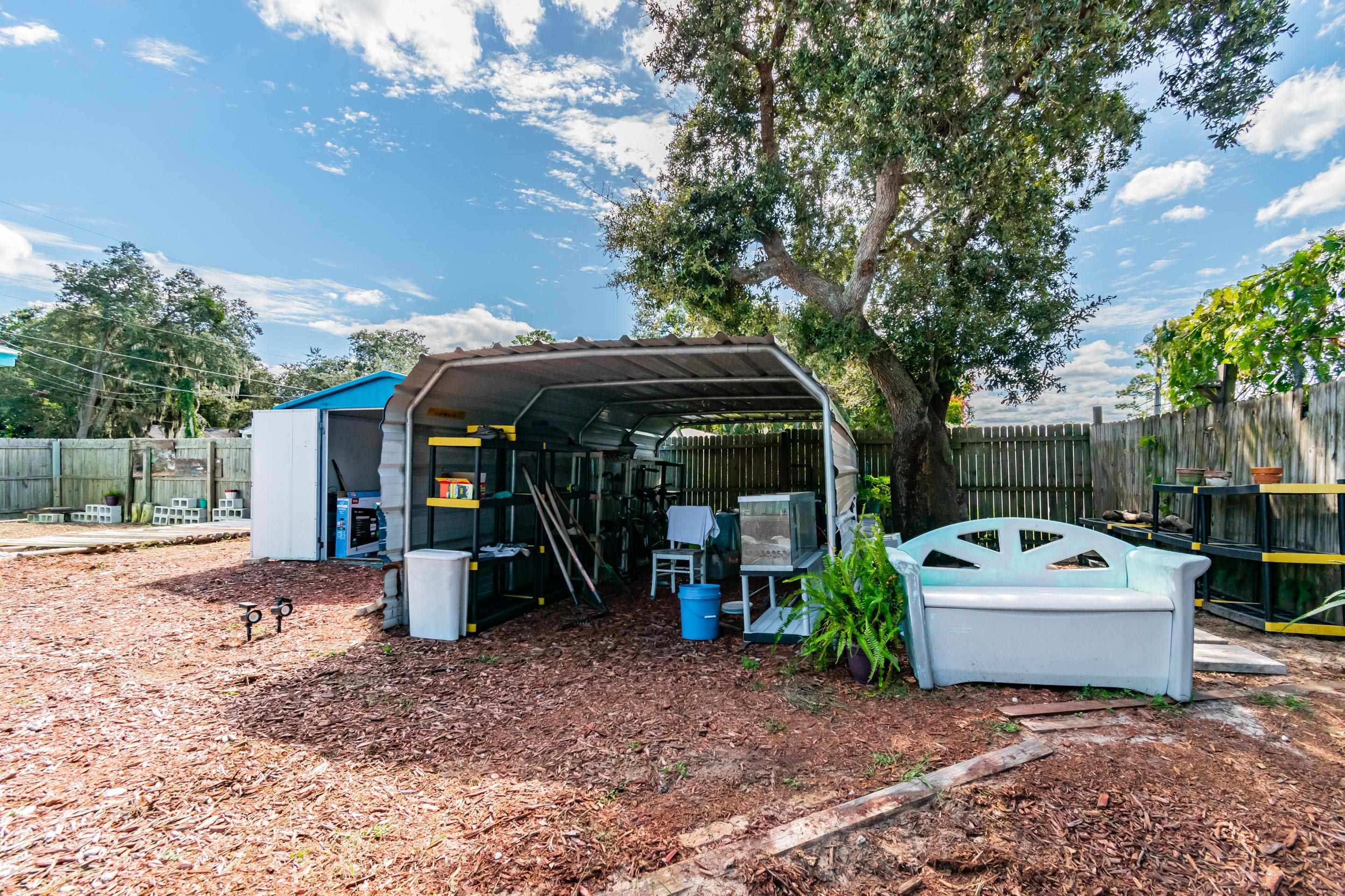 238 Cornell Road St. Augustine, FL 32086 - Photo 27 of 33 a view of a car park in front of house