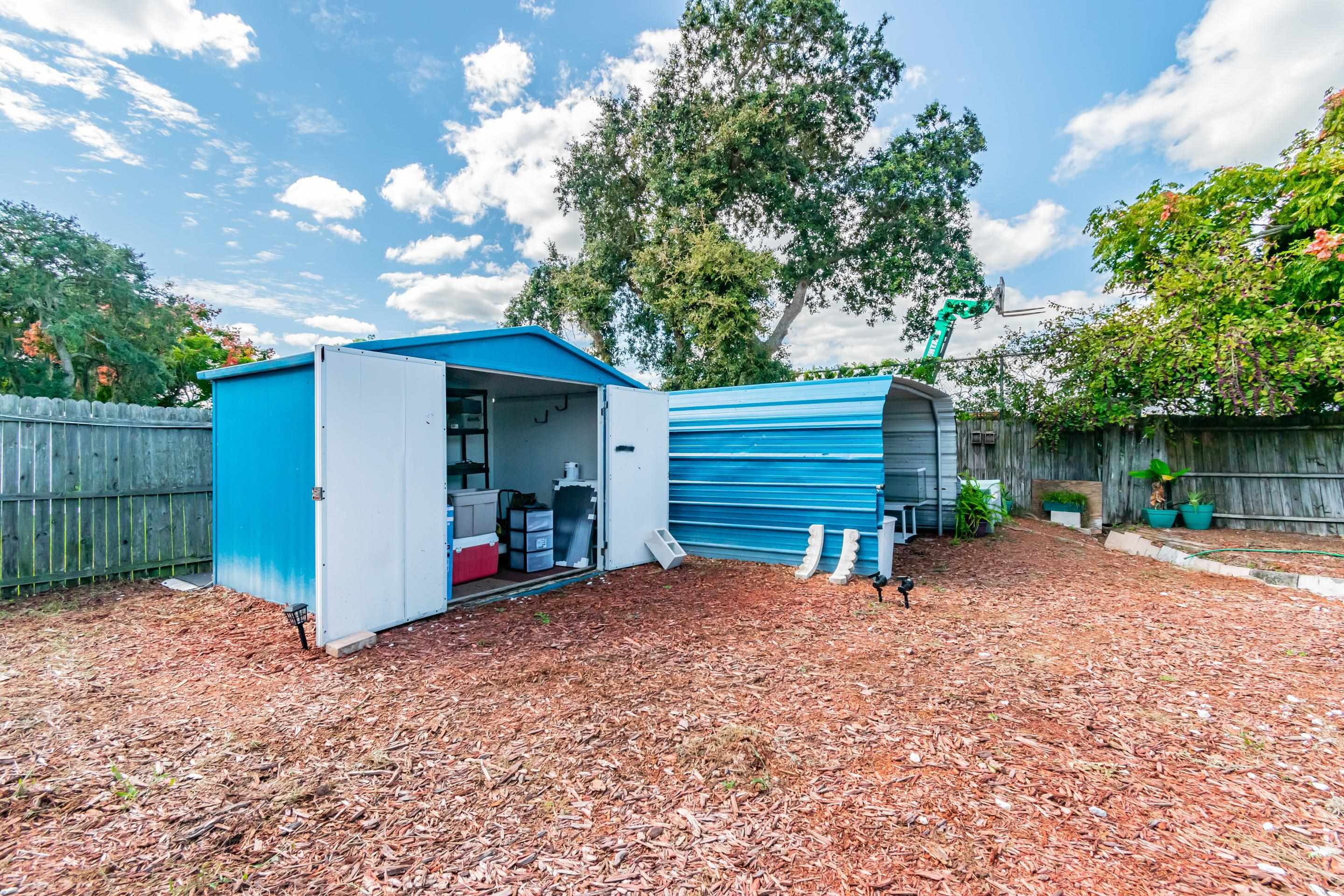 238 Cornell Road St. Augustine, FL 32086 - Photo 29 of 33 a front view of a house with a yard