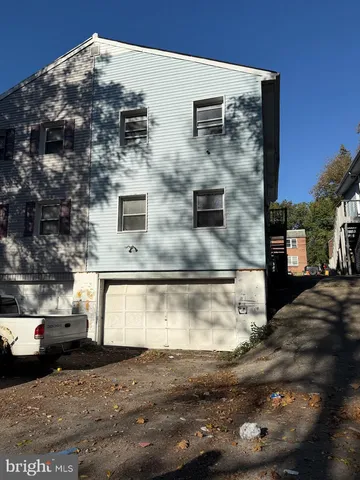 a view of a building with a street