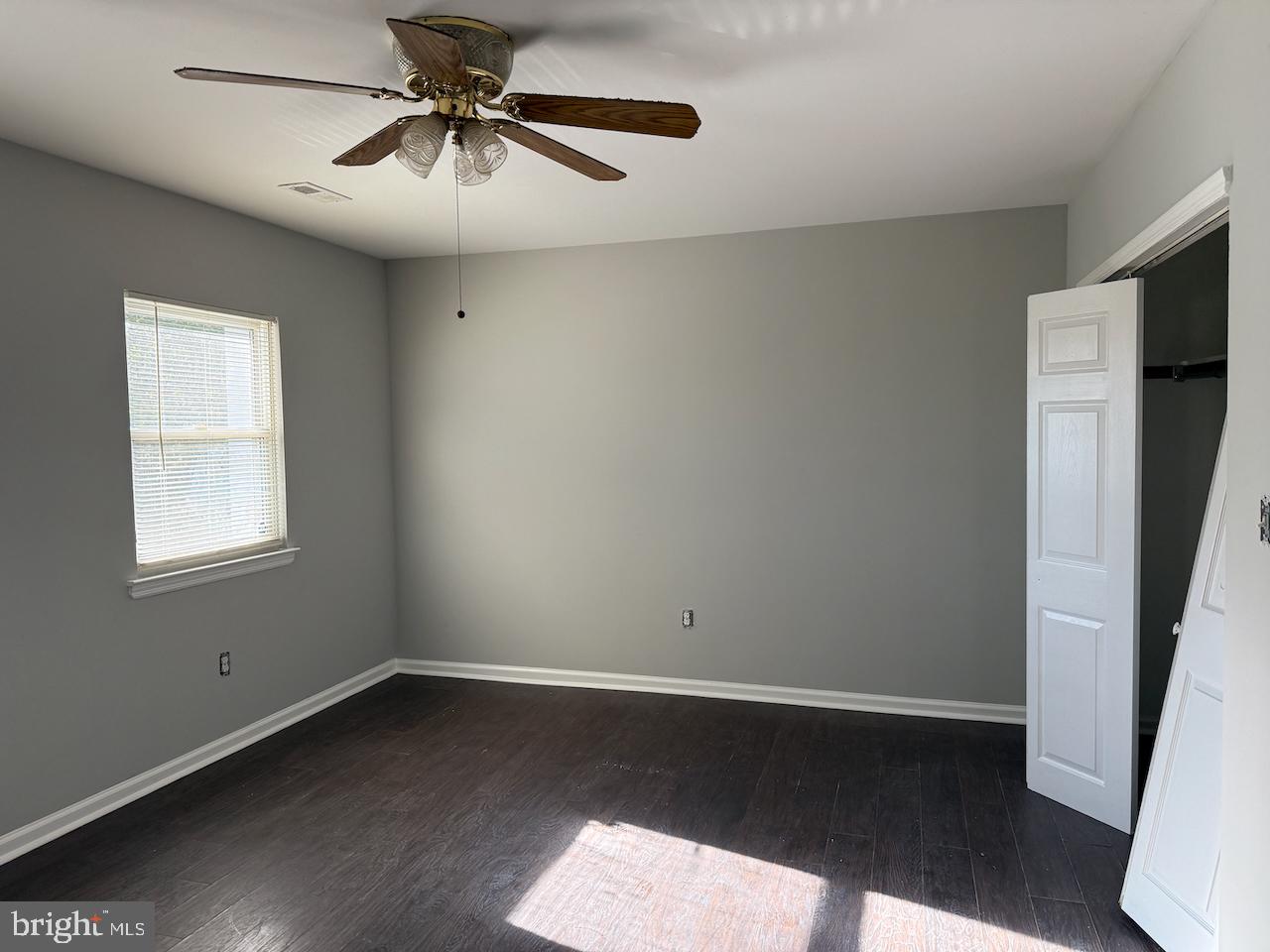 202 Robbins Street Philadelphia, PA 19111 - Photo 5 of 23 wooden floor in an empty room with a window
