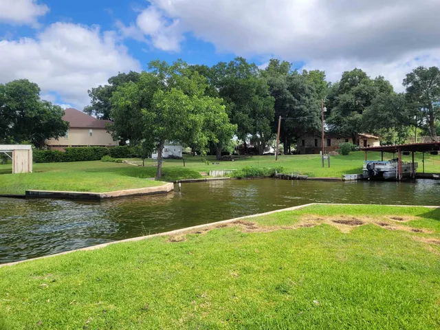 a view of a lake in a garden