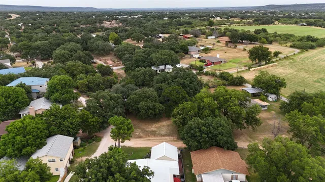 an aerial view of a city with lots of residential buildings