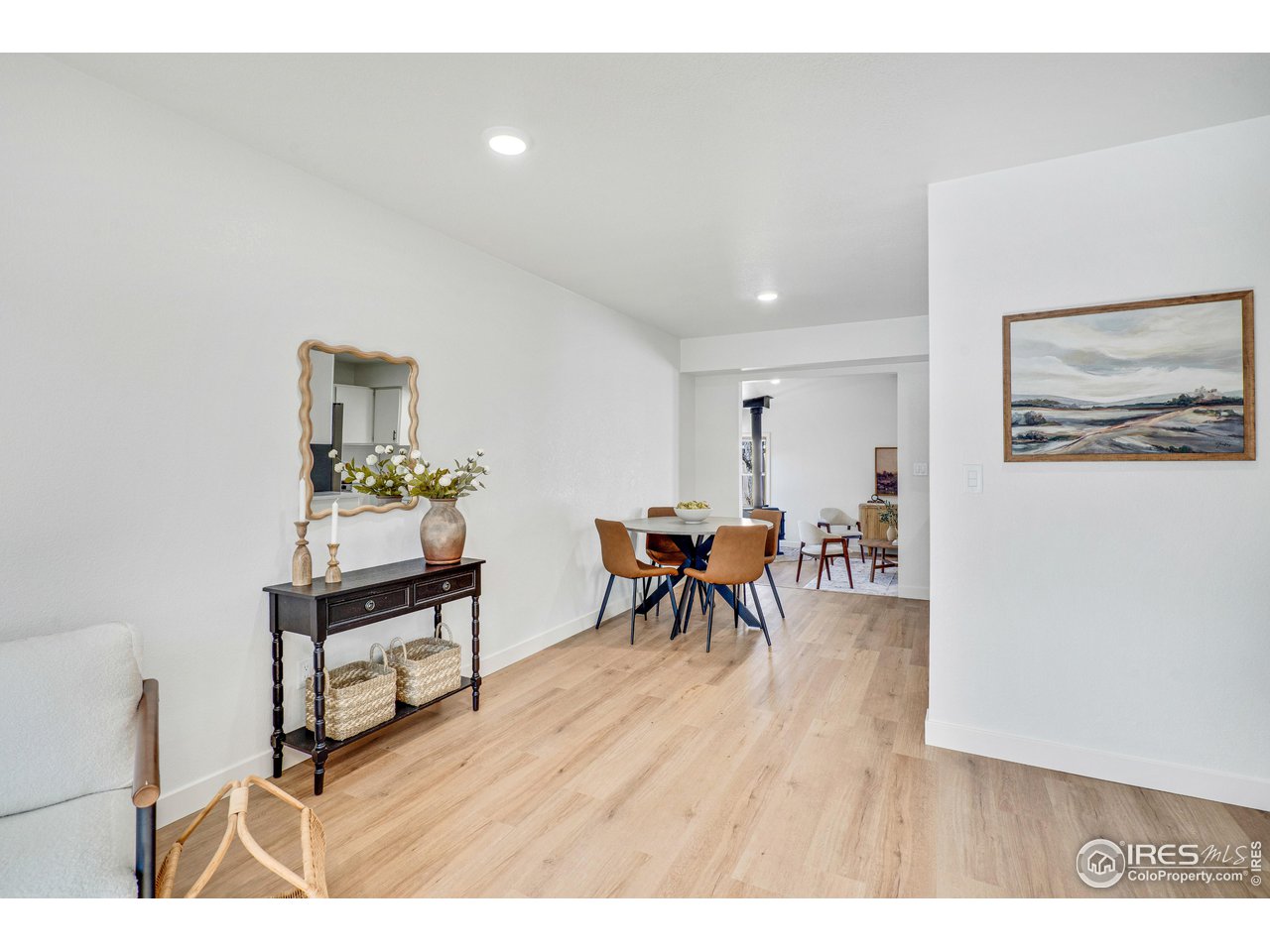 1115 2nd Street Road Eaton, CO 80615 - Photo 14 of 39 a living room with furniture and a table