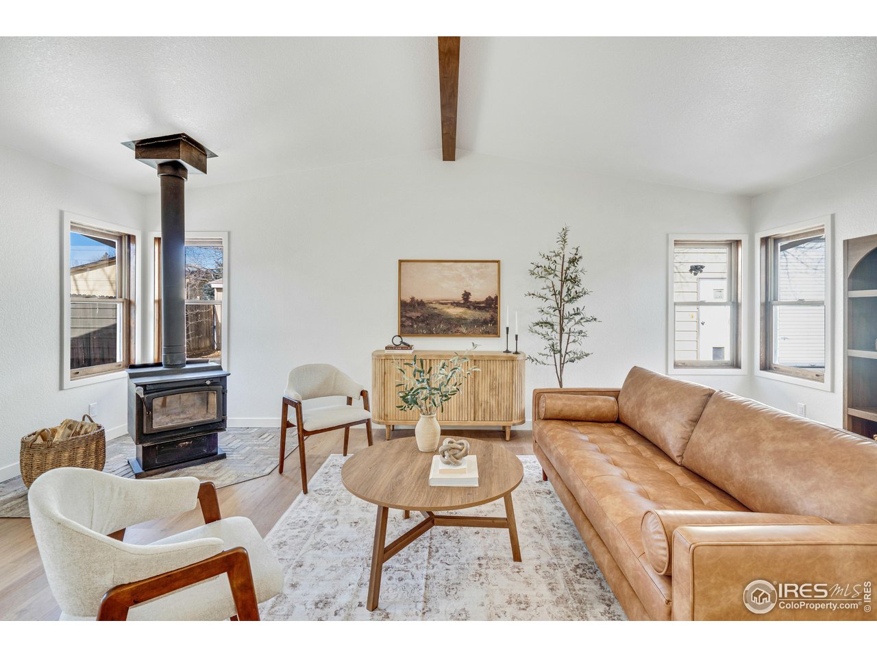 1115 2nd Street Road Eaton, CO 80615 - Photo 17 of 39 a living room with furniture and a large window
