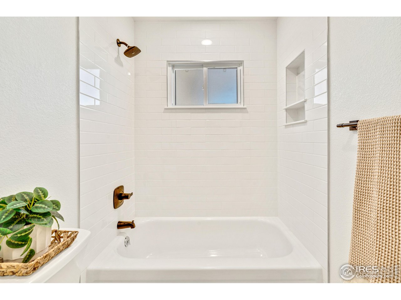 1115 2nd Street Road Eaton, CO 80615 - Photo 23 of 39 a bathroom with a tub