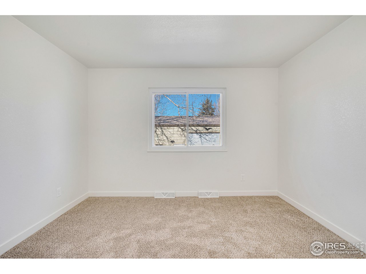 1115 2nd Street Road Eaton, CO 80615 - Photo 33 of 39 an empty room with a window