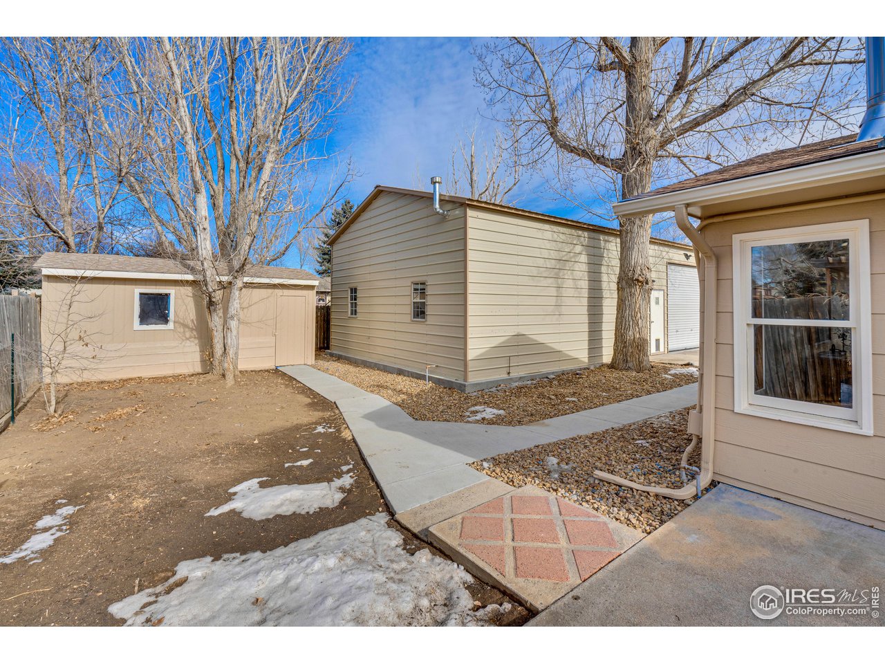 1115 2nd Street Road Eaton, CO 80615 - Photo 36 of 39 a view of a house with a backyard