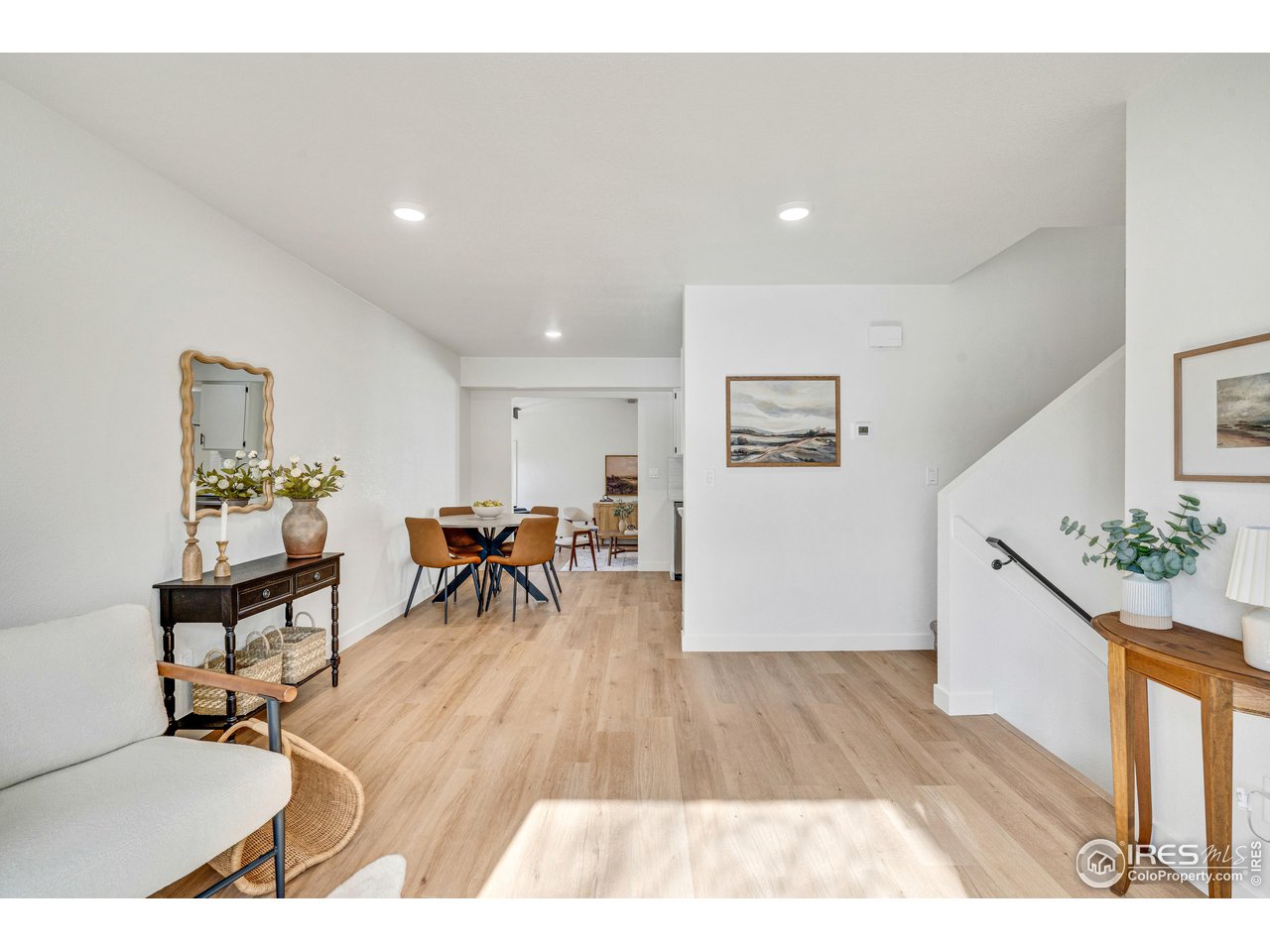 1115 2nd Street Road Eaton, CO 80615 - Photo 7 of 39 a living room with furniture and a wooden floor