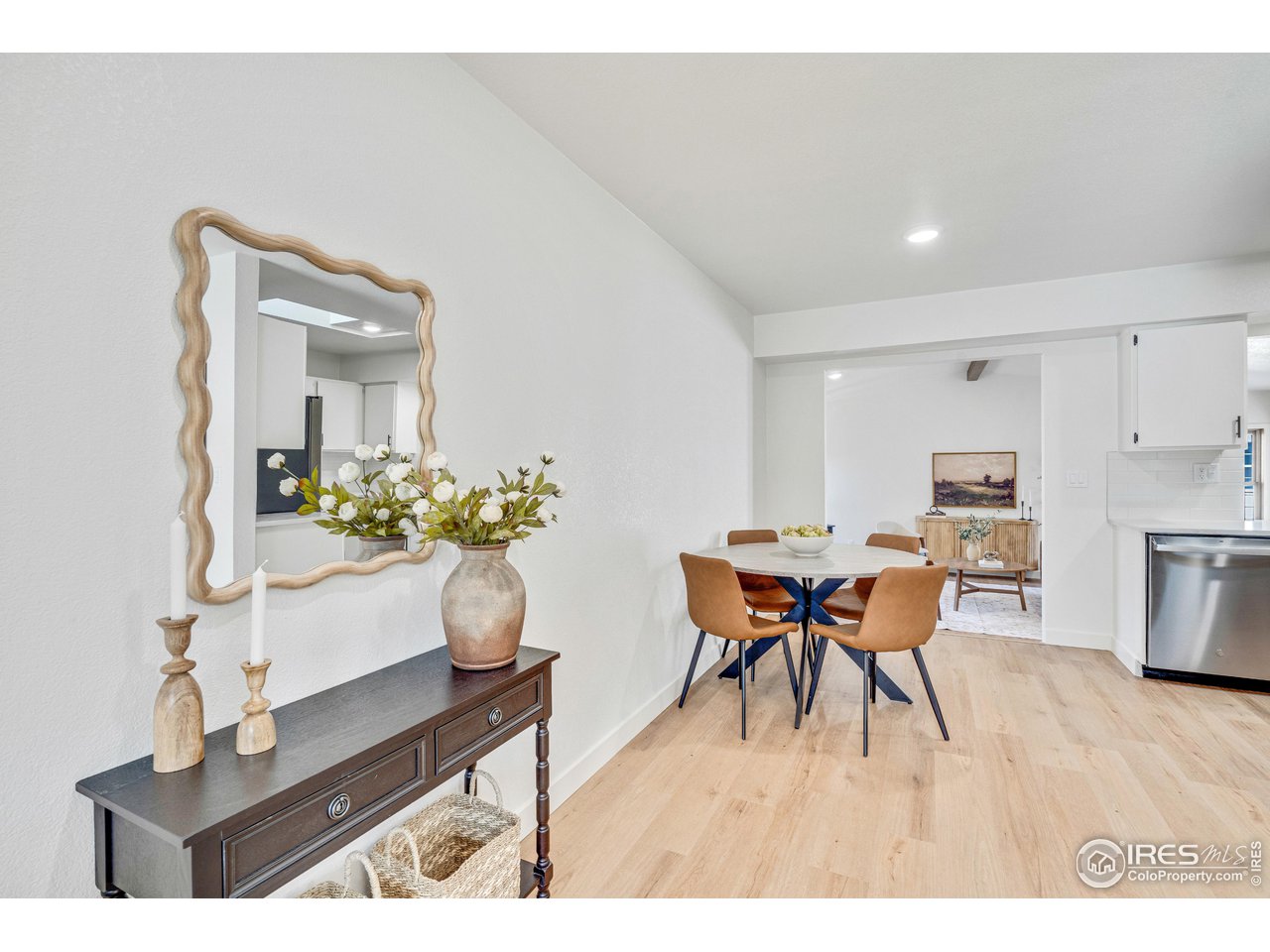 1115 2nd Street Road Eaton, CO 80615 - Photo 8 of 39 a dining room with furniture and wooden floor