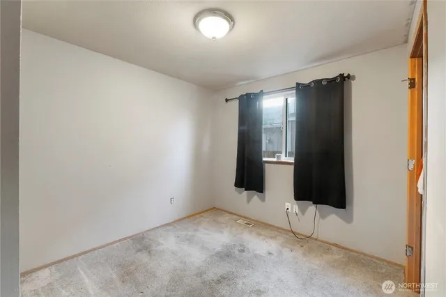 an empty room with an entryway