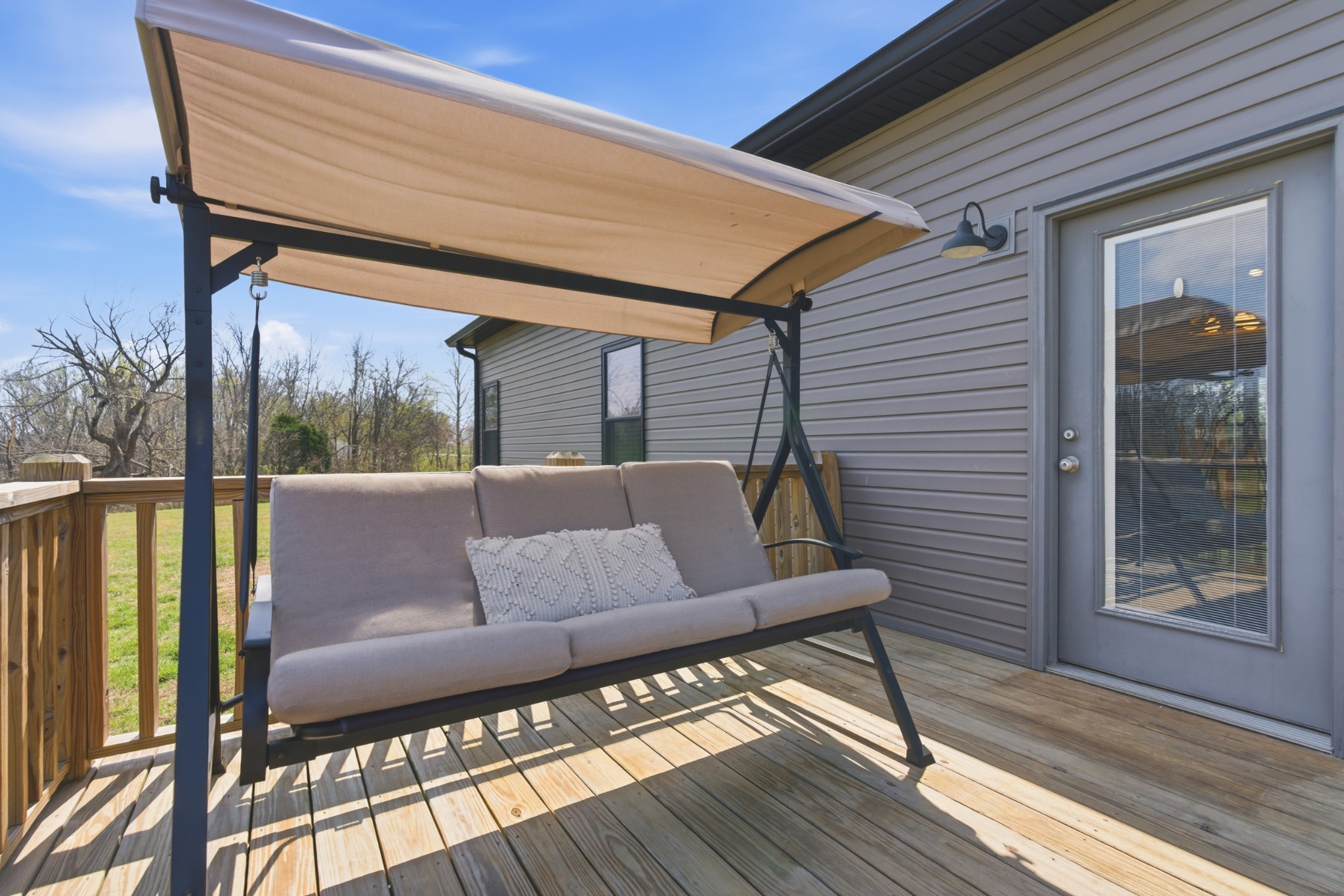 1502 Rock Bridge Road Bethpage, TN 37022 - Photo 25 of 40 a view of balcony with wooden floor and outdoor seating