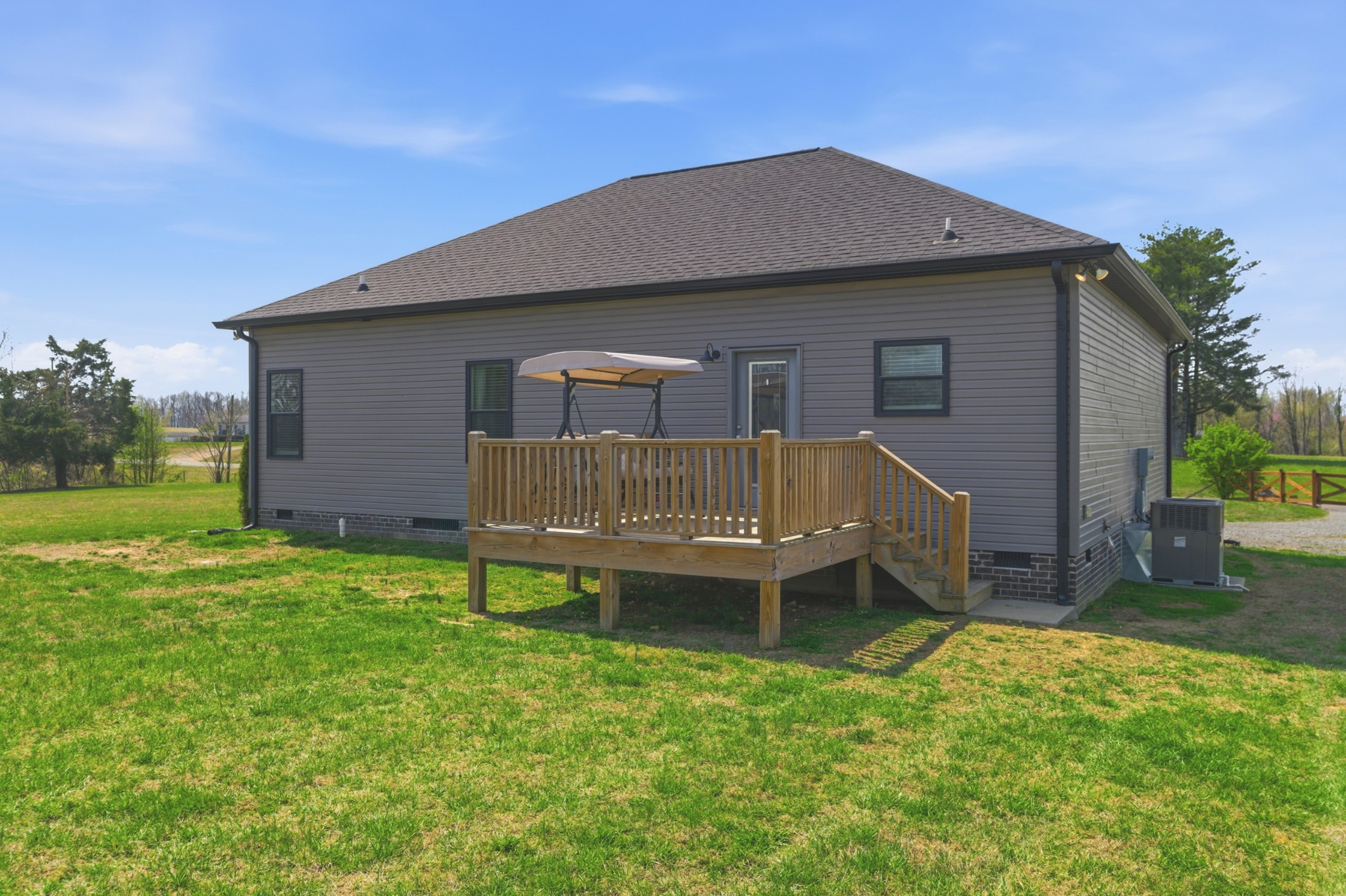1502 Rock Bridge Road Bethpage, TN 37022 - Photo 27 of 40 a backyard of a house with table and chairs