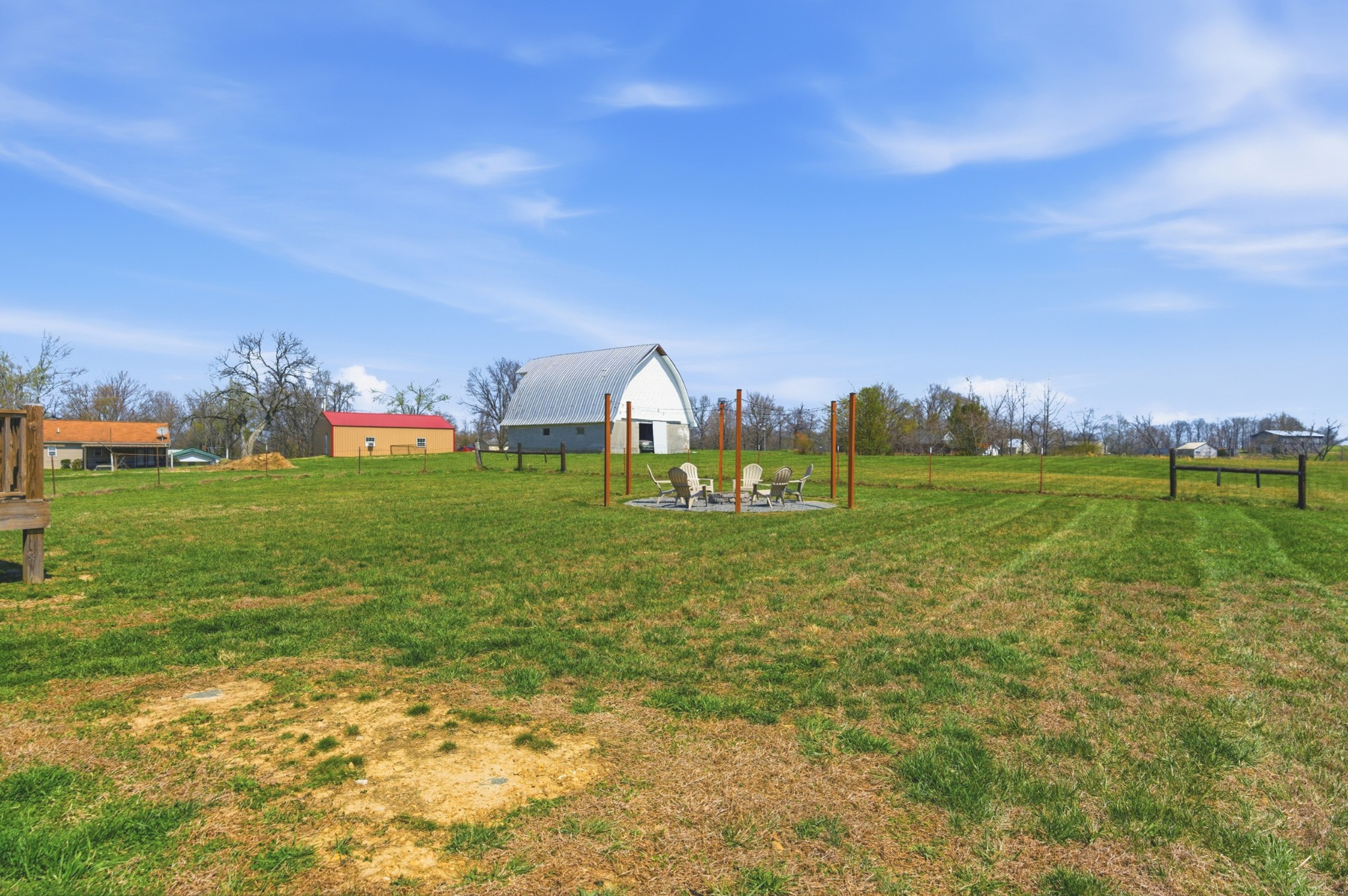 1502 Rock Bridge Road Bethpage, TN 37022 - Photo 30 of 40 a view of a garden with a building in the background