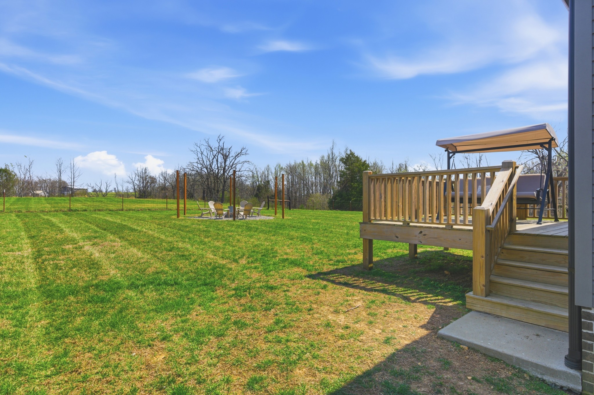1502 Rock Bridge Road Bethpage, TN 37022 - Photo 31 of 40 a view of a bench in the backyard of a house