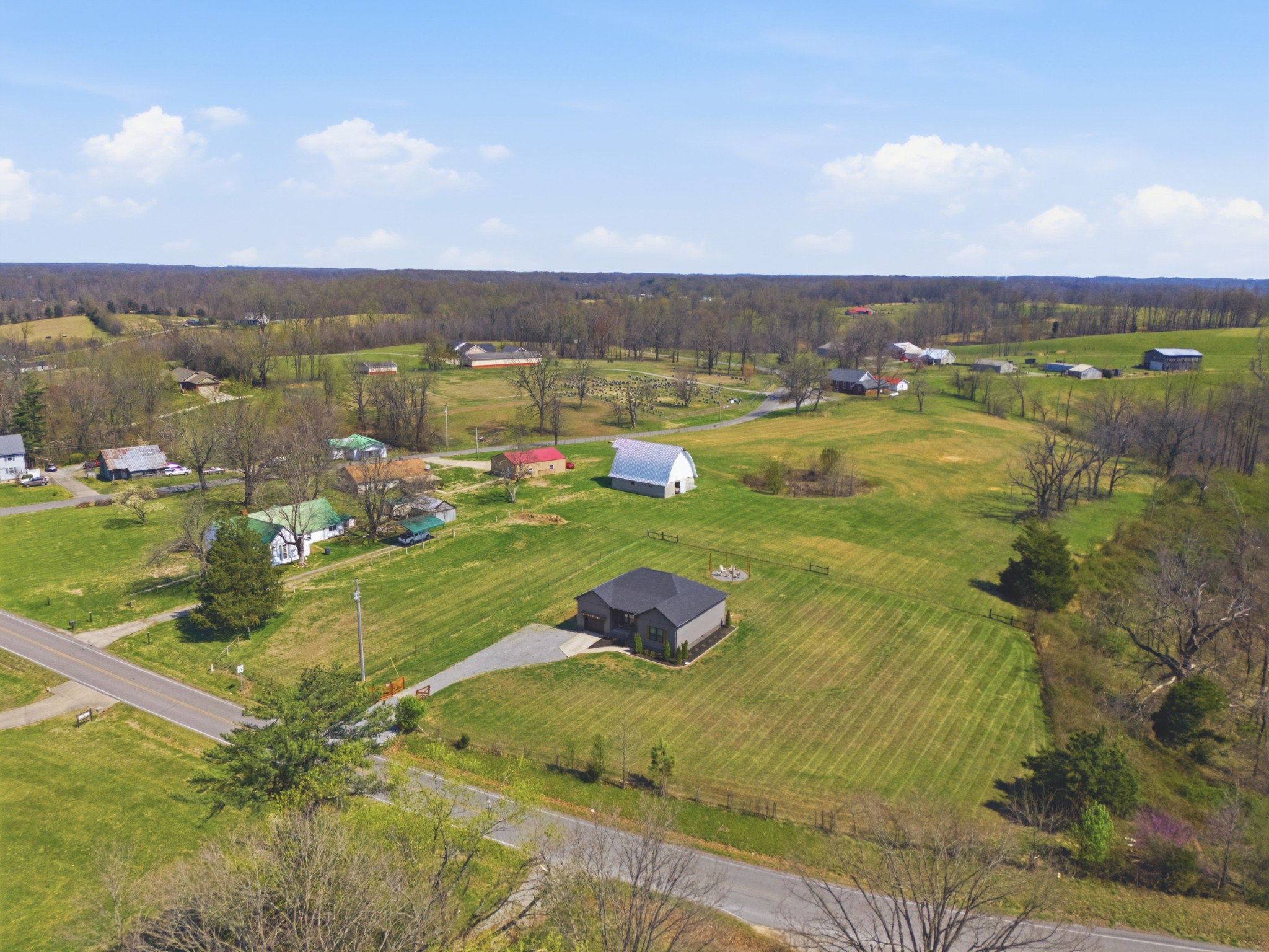 1502 Rock Bridge Road Bethpage, TN 37022 - Photo 39 of 40 a view of a lake with houses in the back