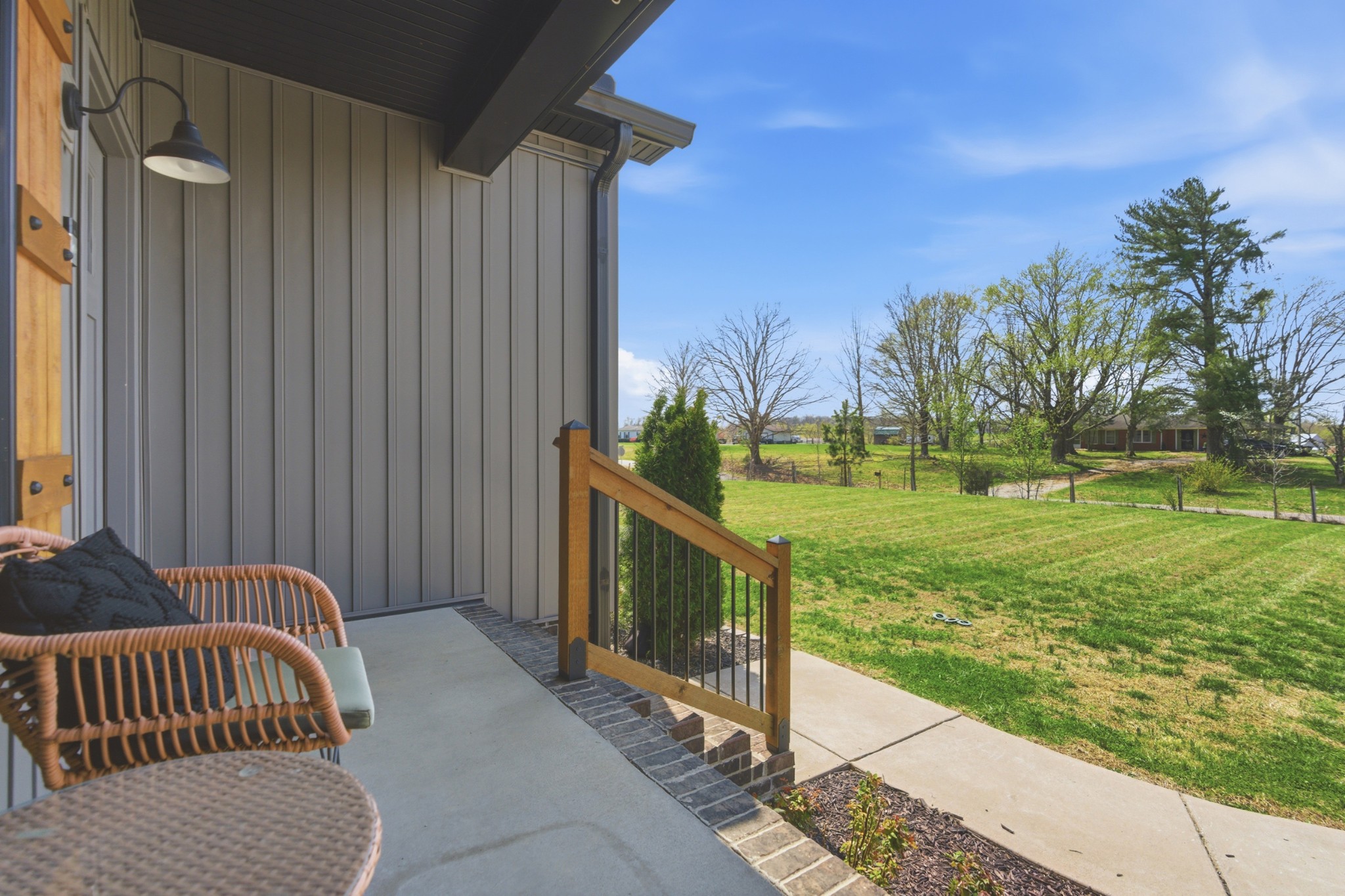 1502 Rock Bridge Road Bethpage, TN 37022 - Photo 5 of 40 a view of a porch with furniture and garden