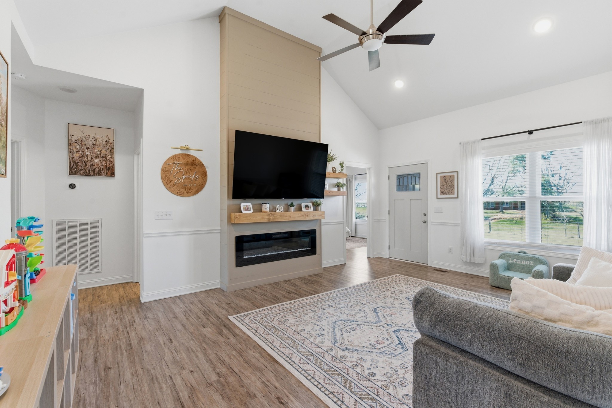 1502 Rock Bridge Road Bethpage, TN 37022 - Photo 6 of 40 a living room with furniture and a flat screen tv