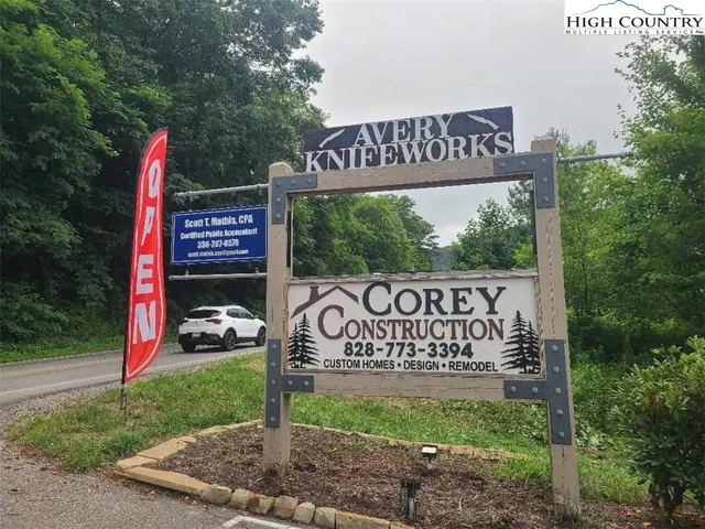 a front view of a house with parking