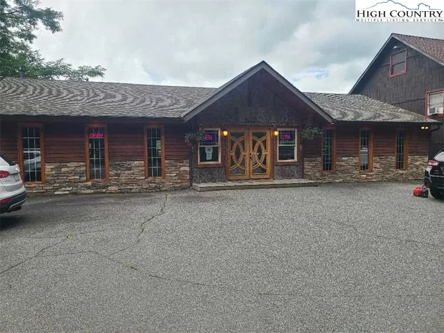 a view of street with parked cars