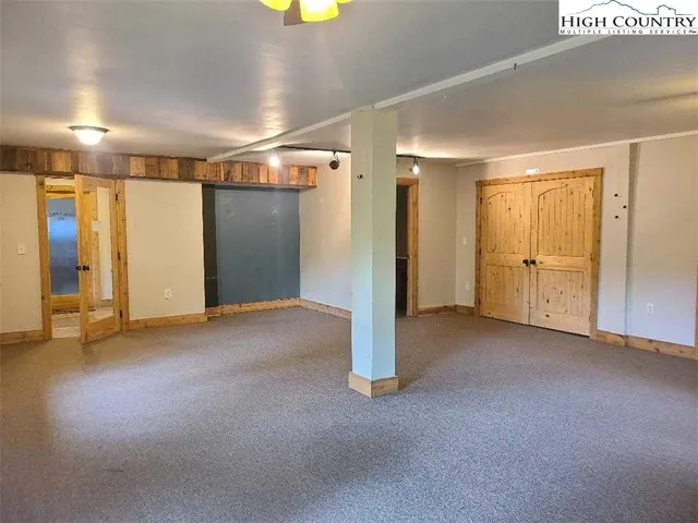 a view of empty room with windows