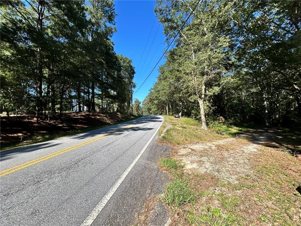 31 Creekwood Road Winder, GA 30680 - Photo 2 of 14 a view of yard with large trees
