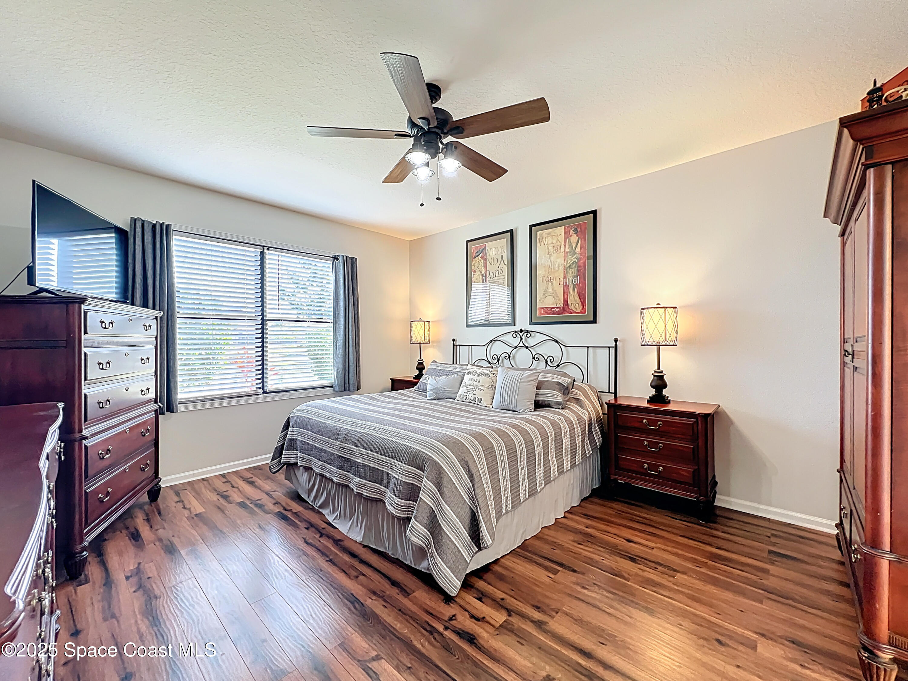 1110 Bolle Circle Rockledge, FL 32955 - Photo 24 of 39 a bedroom with a bed and a window