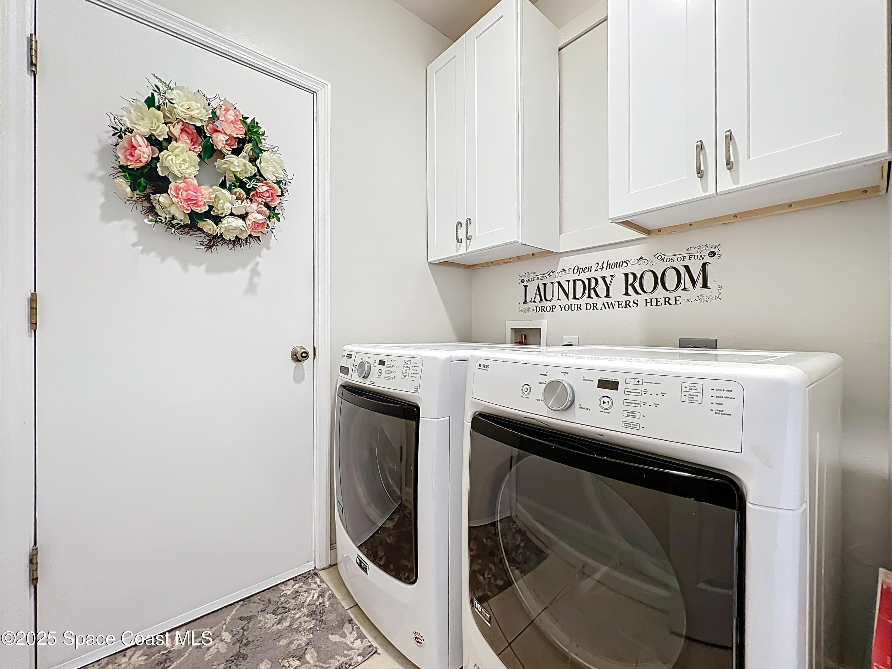 1110 Bolle Circle Rockledge, FL 32955 - Photo 27 of 39 a utility room with dryer and washer