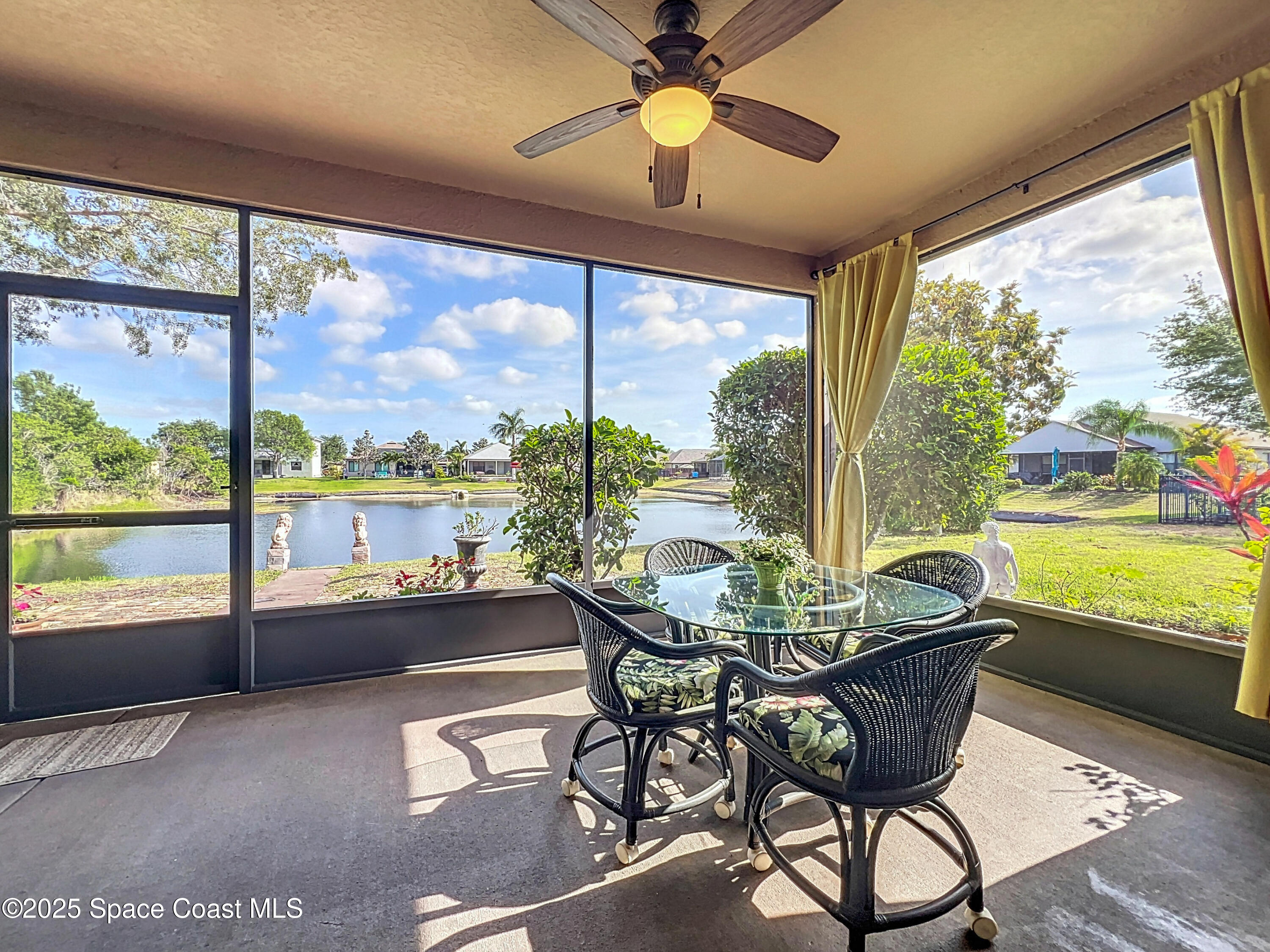 1110 Bolle Circle Rockledge, FL 32955 - Photo 28 of 39 a view of a dining room with furniture window and outside view