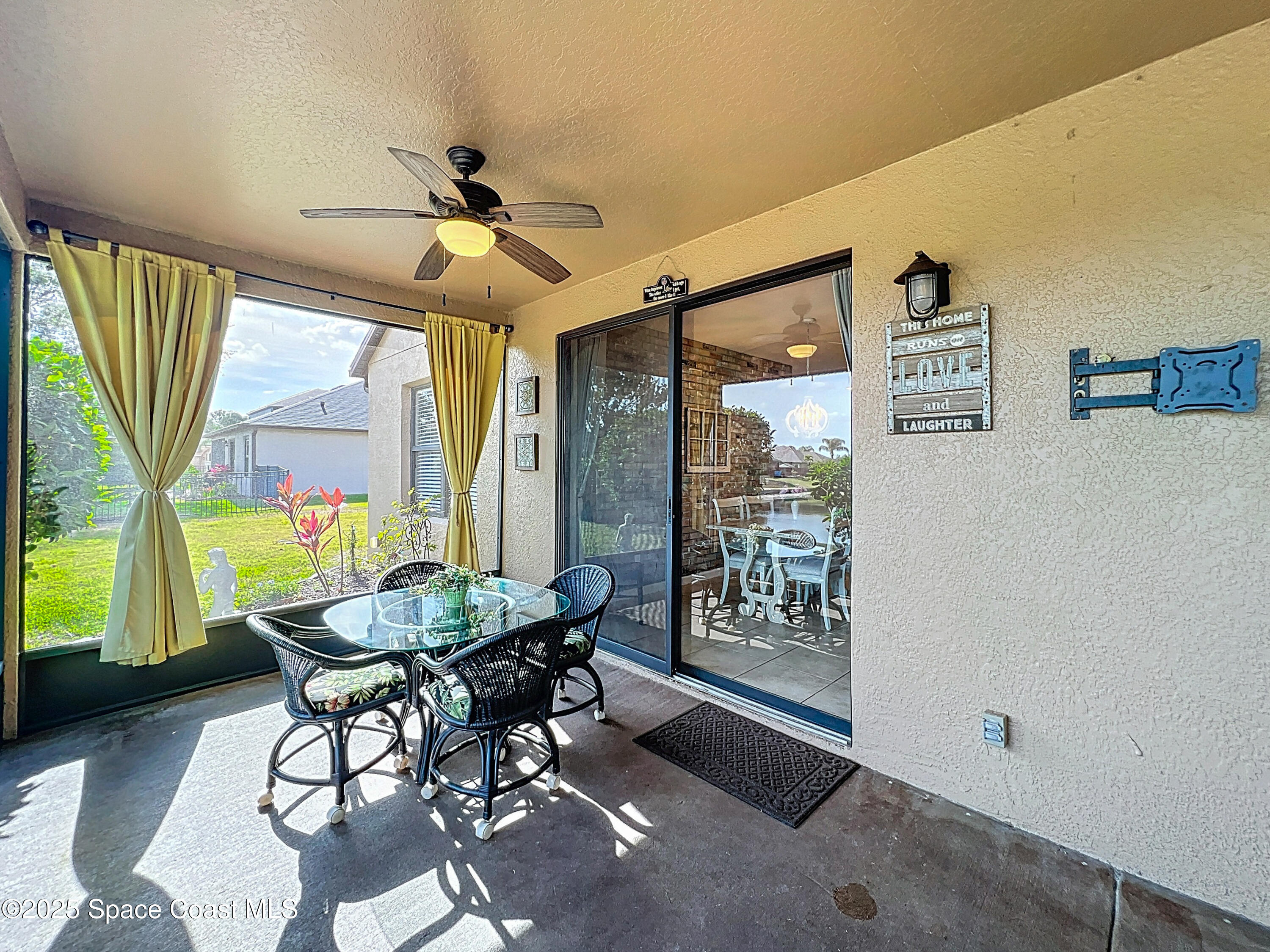 1110 Bolle Circle Rockledge, FL 32955 - Photo 31 of 39 a workspace with tables and chairs