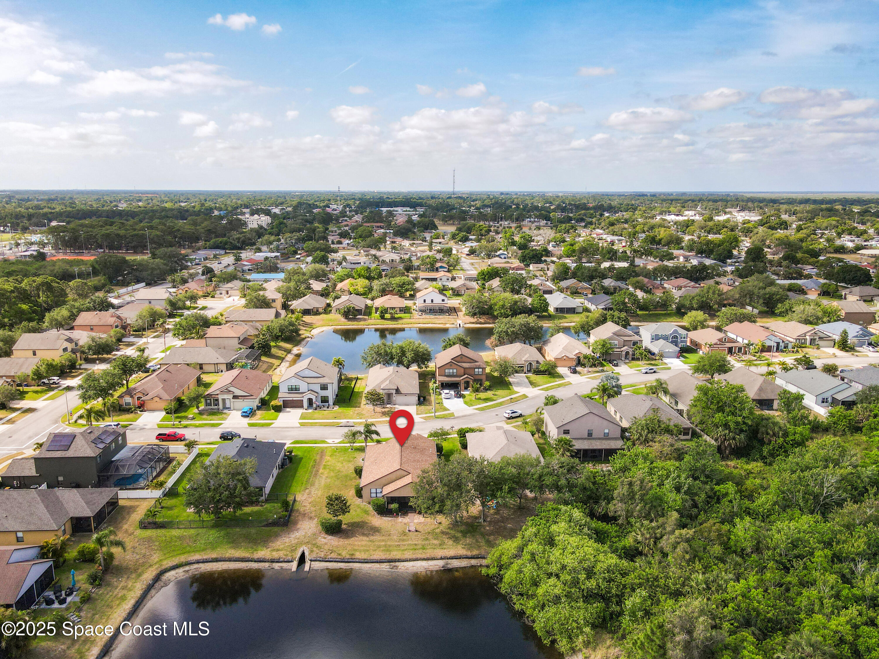 1110 Bolle Circle Rockledge, FL 32955 - Photo 39 of 39 an aerial view of residential houses with outdoor space and trees