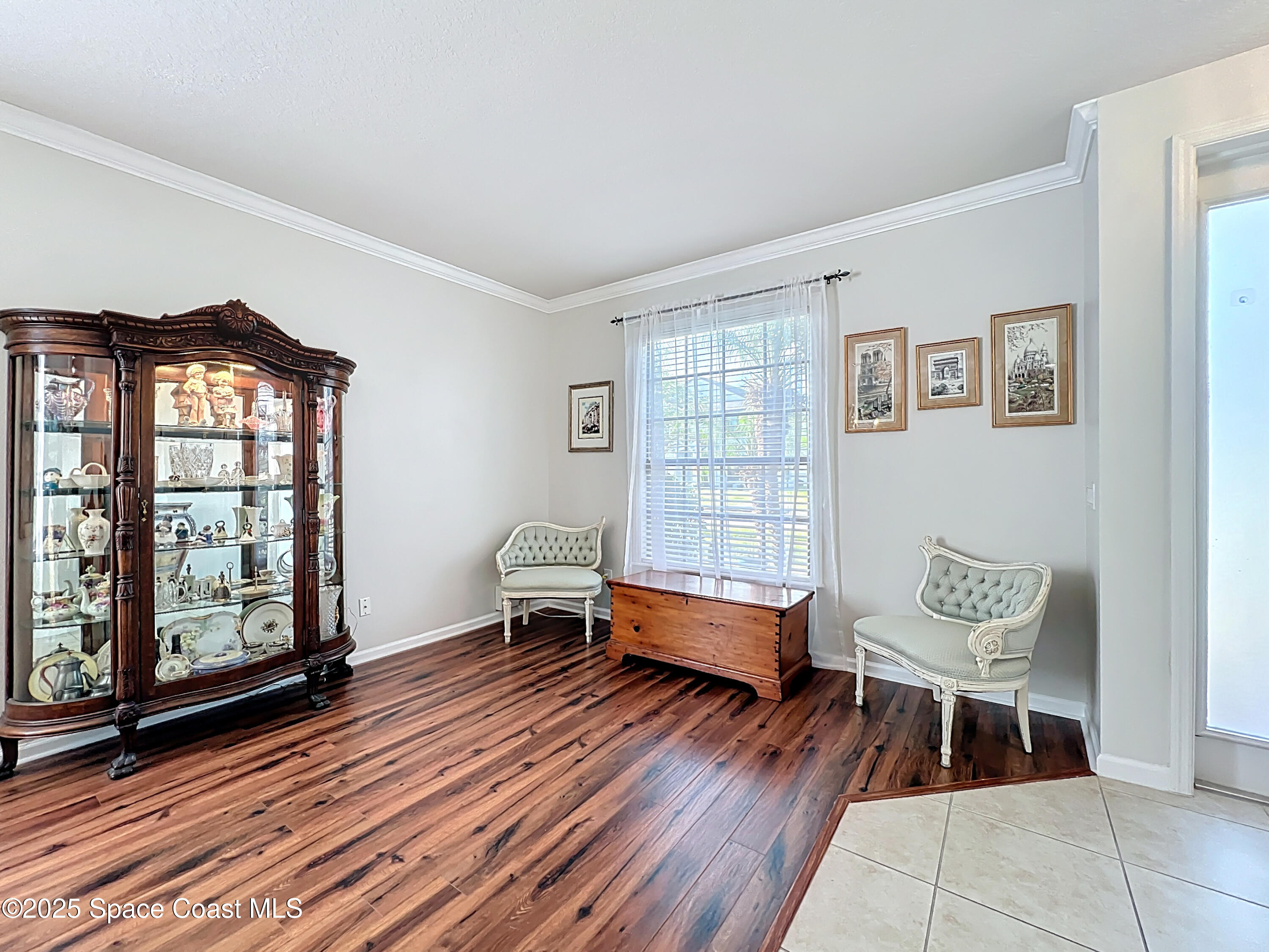 1110 Bolle Circle Rockledge, FL 32955 - Photo 4 of 39 a living room with furniture and two windows