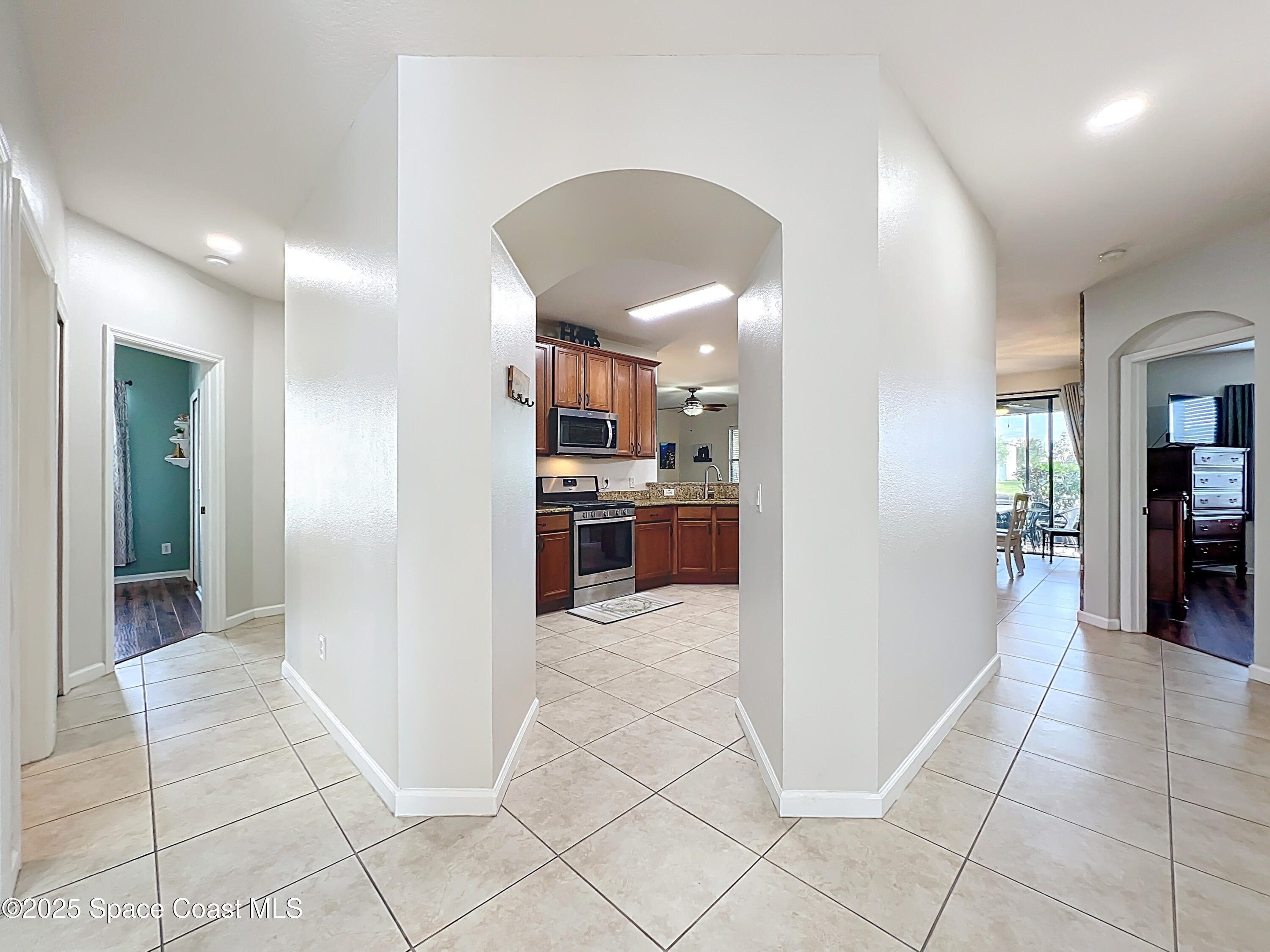 1110 Bolle Circle Rockledge, FL 32955 - Photo 6 of 39 a view of a kitchen cabinets and refrigerator