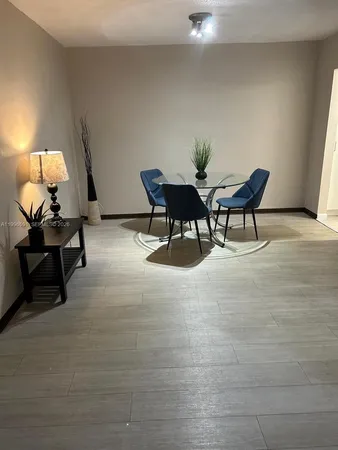 a workspace with furniture and lamp