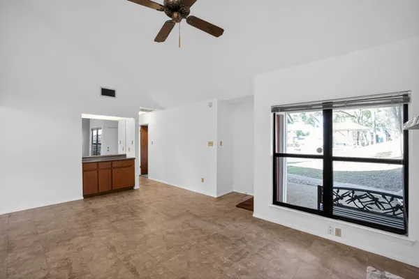 a kitchen with stainless steel appliances a refrigerator and a stove