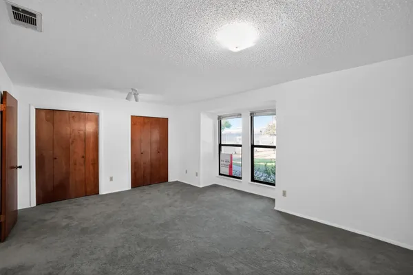 a bathroom with a sink a mirror and a bathtub