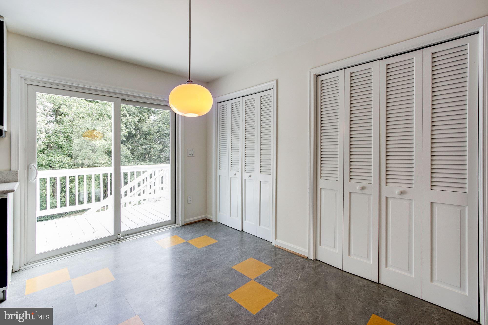 471 Fairhaven Road Tracys Landing, MD 20779 - Photo 12 of 40 a view of empty room with wooden floor and fan